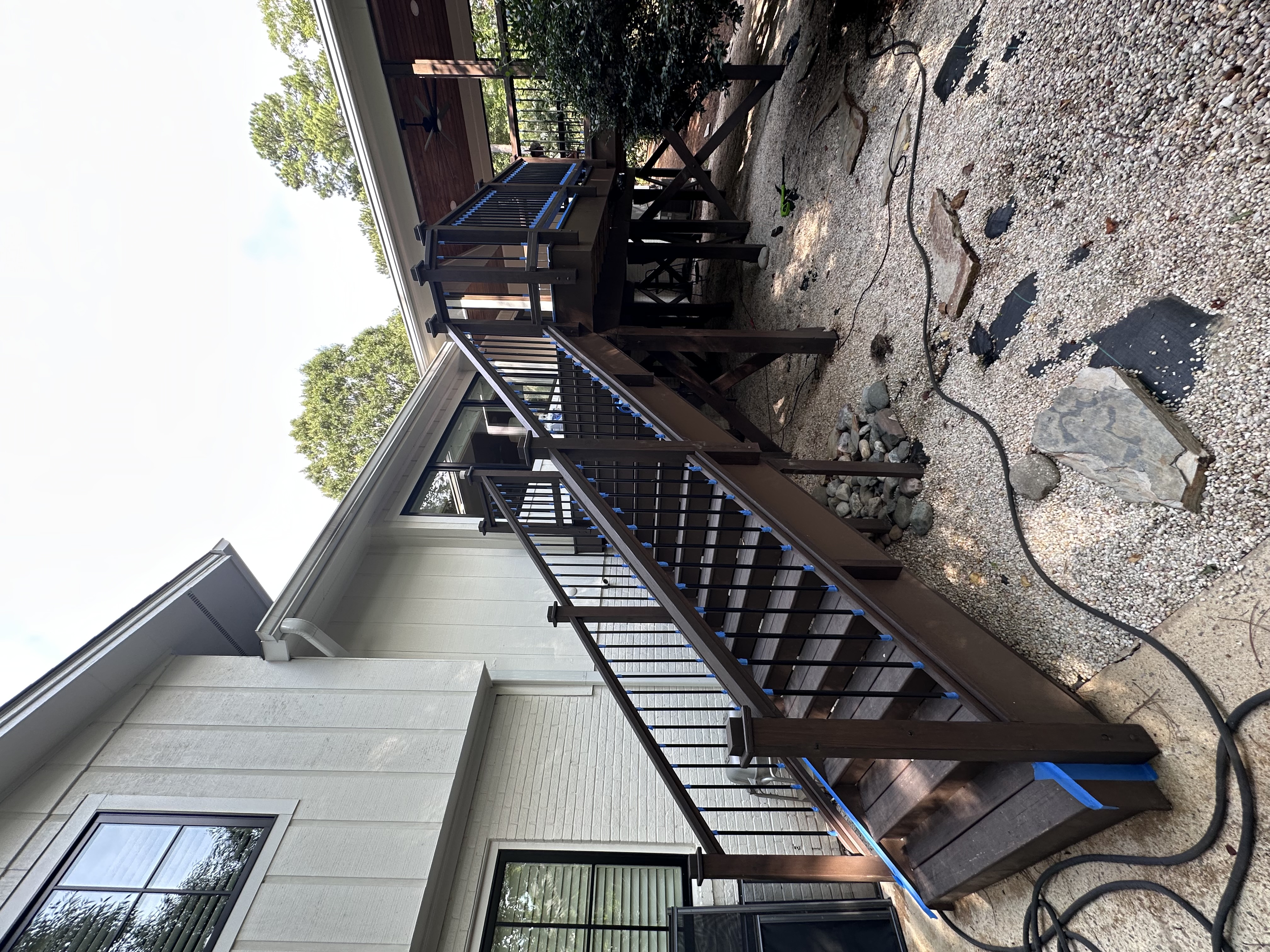 Weathered deck and fence before staining
